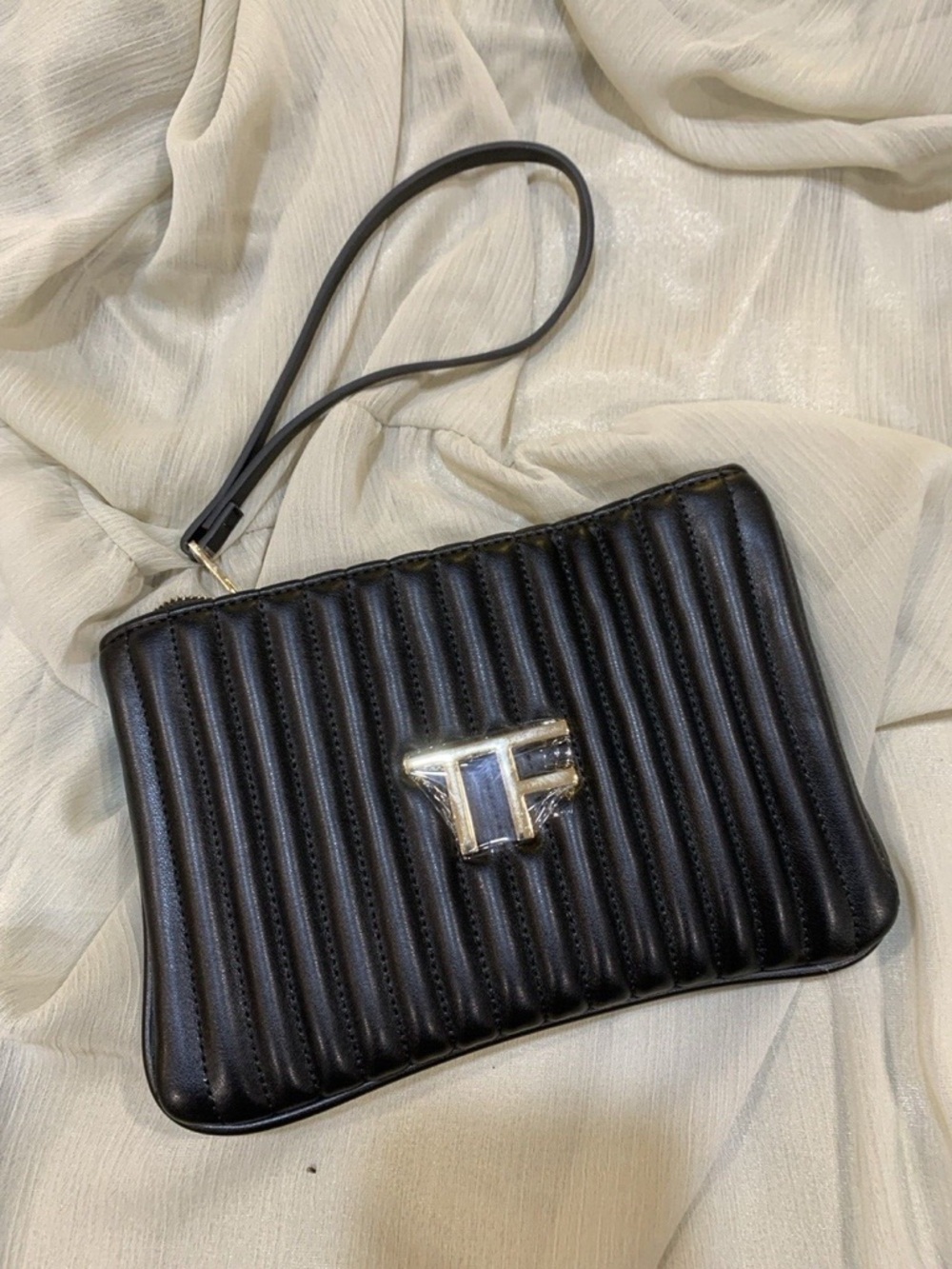 TF Black Quilted Wristlet Clutch with gold logo